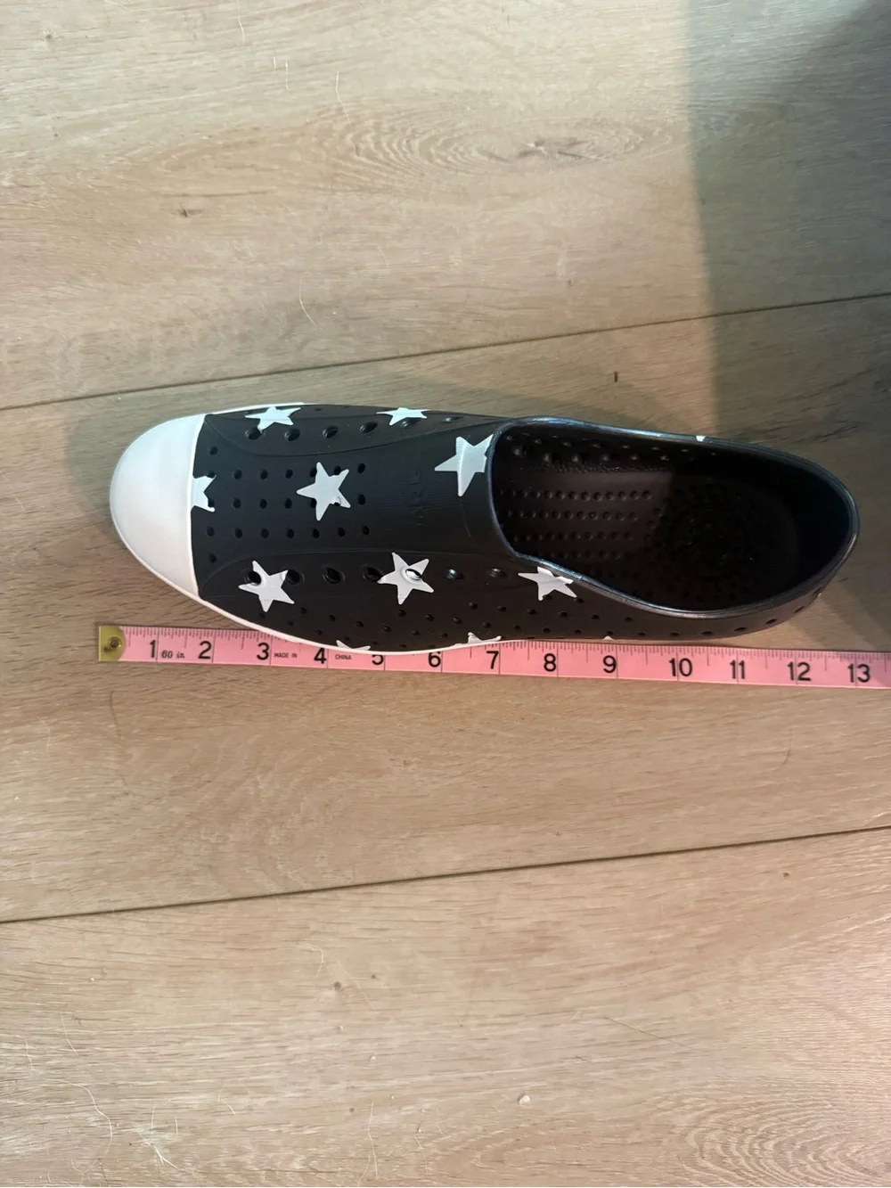 Native Adult Shoes Jefferson Slip-On in Black with White Stars